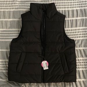 Black puffer vest brand new with tags size L/G 10/12 girls